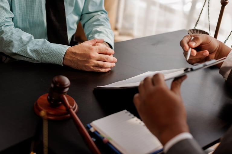 law and justice. Lawyer Legal counsel presents to the client a signed contract with gavel and legal law.